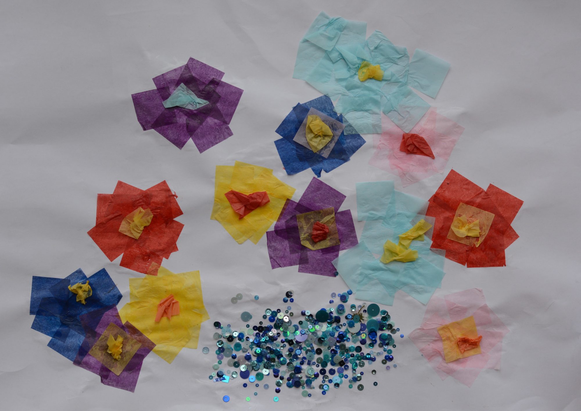 flower collage using coloured tissue paper and sequins