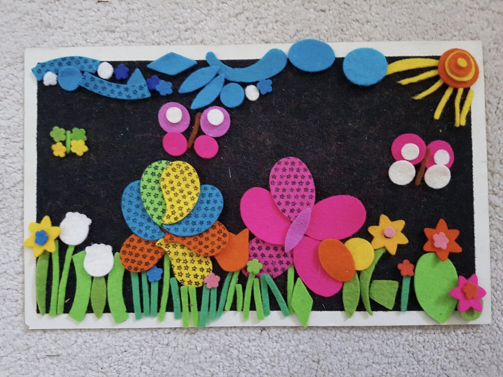 Fuzzy felt flower garden with butterflies